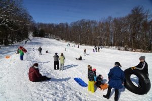 Snowy weather comes in time for annual Toboggan Festival